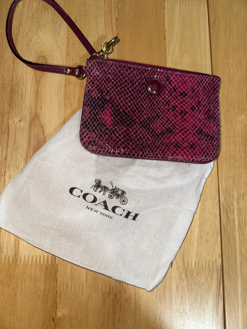 Coach Pink Snake-Embossed Wristlet